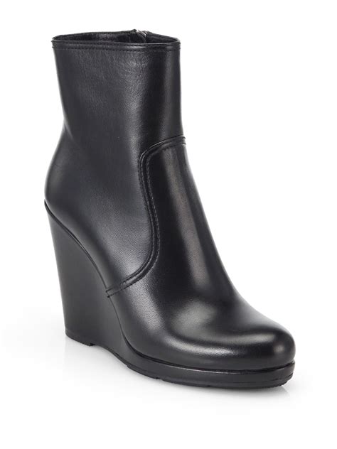 prada wedge boots.